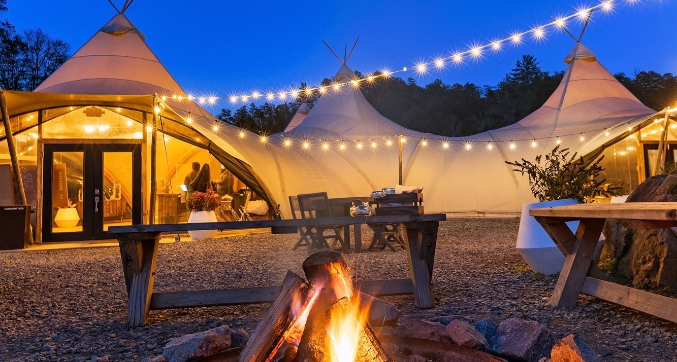 Camp Unwritten with Reese’s Book Club with Ally Condie at Under Canvas Great Smoky Mountains - Pigeon Forge, TN Logo